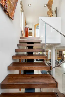 Contemporary Stairway by Desert Earth And Wood, LLC
