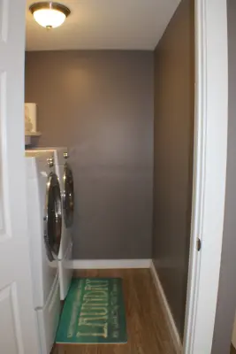Contemporary Renovation of Mudroom and Bathroom by Midwest Remodeling