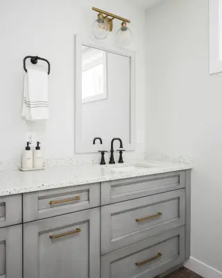Balanced and Luminous Bathroom by Wise Design & Remodel LLC
