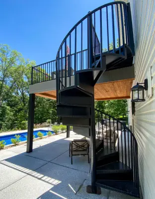 Updated Underdecking, Railing, Post Covers, and Spiral Staircase for Current Deck by Heartlands Building Company
