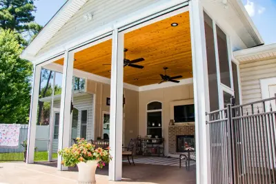 Alfresco Living Space, Grilling Zone, and Dining Room Expansion by Heartlands Building Company