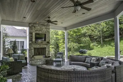 Stone Fireplace Outdoor Lounge by Heartlands Building Company