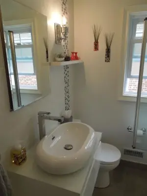 Porcelanosa Bathroom Tile Renovation by Done Right Remodeling, Inc.
