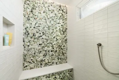 Ocean Glass Bathroom Renovation — Design-Build Services project by HO'OKIPA Design & Construction