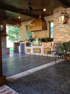 Southern Pathway Outdoor Cooking Space by Jackson Construction, Inc.