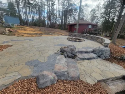 Man Made Boulder Steps-Fire Pit-Retaining Wall — Landscape Design project by Plant Man