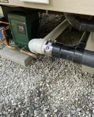 Water Drainage Installation — Heating & Cooling Services project by Heritage Home Service