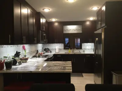 Modern Dark Kitchen — Kitchen Remodeling project by Timberland Building Solutions