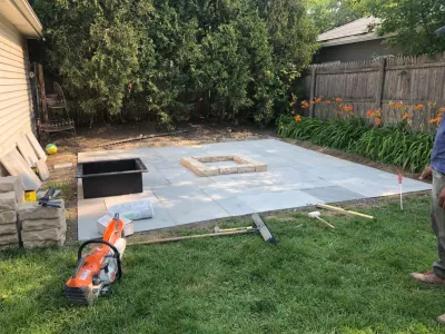 Custom Backyard Fire Pit in Wilmette by Sylvia's Landscaping Company, LLC