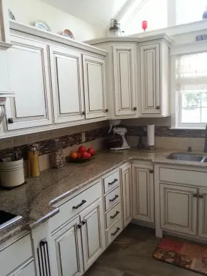 Glossy Kitchen Cabinets with Stone Countertops and Subway Tile — Kitchen Remodeling project by Millwork Supply