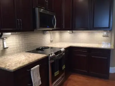 Classic Kitchen with Dark Cabinetry — Kitchen Remodeling project by Hardwood Specialties