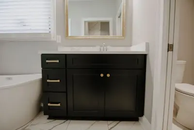 A Dual-Designed Primary Bathroom for Him and Her — Kitchen Remodeling project by Corvin's Floor Coverings & Cabinetry