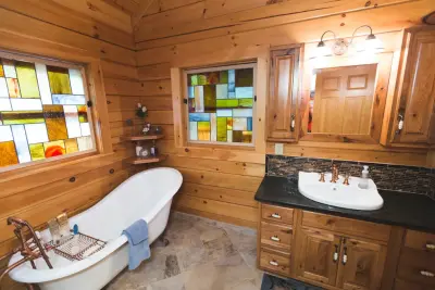 Log Cabin Bathrooms — Kitchen Remodeling project by Cavender's The Interior Company