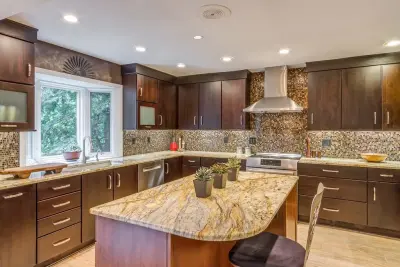 Contemporary Espresso Slab Cabinetry — Kitchen Remodeling project by The Kitchen Place