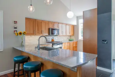 Contemporary Charming Cherry Kitchen — Kitchen Remodeling project by Chris Van Genechten - Kitchen & Bath Design