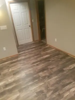 Oak Laminate Lodge on Oakwood Drive — Home Renovation & Remodeling Services project by Weisbrich Construction, LLC