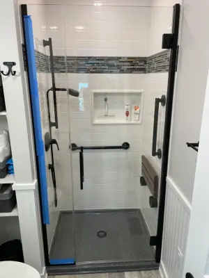 Obsidian Shower — Home Renovation & Remodeling Services project by Modern Builders Co LLC