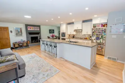 Modern Open Kitchen Renovation — Home Renovation & Remodeling Services project by Badger Carpentry, Inc.