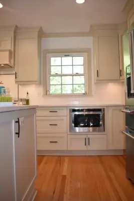 Renovation of Open Kitchen, Living Room, Dining Area, and Bathroom — Home Renovation & Remodeling Services project by Redsmith Construction, LLC