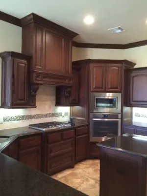 Classic Dark Wood Culinary Space — Home Renovation & Remodeling Services project by Anderson Trim Inc