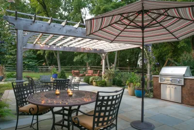 Relaxed Patio Spaces Featuring Cook Station and Pergola — Landscape Construction project by Burke Brothers Landscape Design/Build
