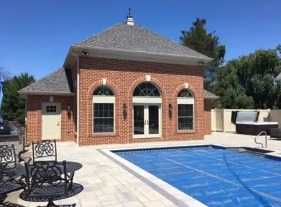 Poolside House, Sunroom, and Paver Patio — Home Renovation & Remodeling Services project by Stoney Brooke Home Renovations & Design