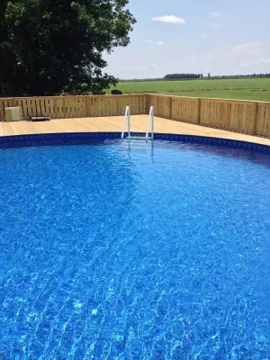 Decked Pool Area — Home Renovation & Remodeling Services project by Stan Morris Construction LLC