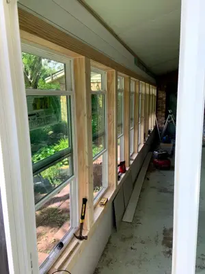 Porch to Sunroom Transformation — Home Renovation & Remodeling Services project by Windmill Heritage LLC