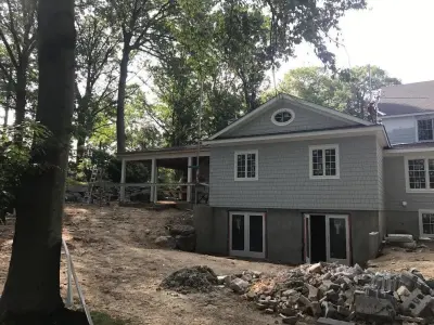 Pelham Manor, NY Hardie Siding and Trim Rear Addition — Home Renovation & Remodeling Services project by Tri-State Architectural Design, LLC
