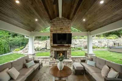 Back Patio Awning with Stone Hearth — Home Renovation & Remodeling Services project by Lakeside Renovation & Design