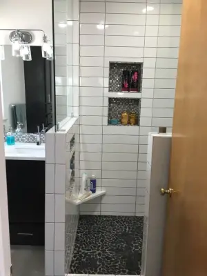 Updated White Bathroom — Home Renovation & Remodeling Services project by Carlisle Builders