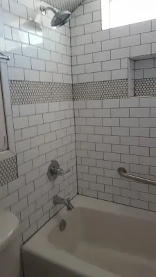 Vintage Tub Enclosure — Home Renovation & Remodeling Services project by Habitation Inc