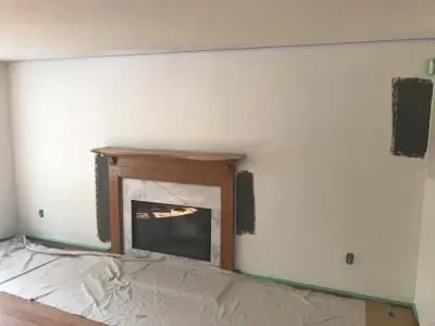 Feature wall and fireplace mantle — House Painting Services project by Grit City Painters