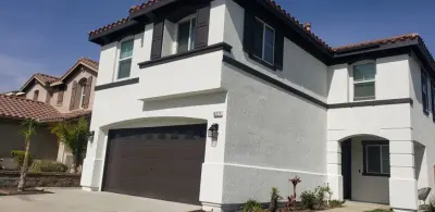 Exterior Painting Project - Elegant White with Dark Accents — House Painting Services project by Garcia's Pro Painting Services