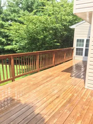 Deck Staining | Transformation Showcase — House Painting Services project by Sheldon And Sons Painting