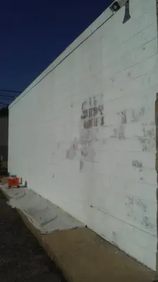 Exterior Block Preparation and Painting — House Painting Services project by Paint Plus