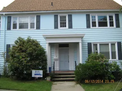 Wooden House Exterior Painting — House Painting Services project by Bentler Painting