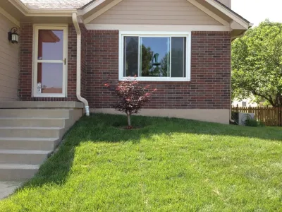 New landscape & retaining wall — Landscape Construction project by Garden Gate Lawn & Landscape, LLC in Raymore