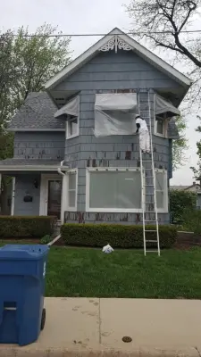 Cedar Shake Exterior Renovation in Crete, IL — House Painting Services project by Calumet Painting & Restoration