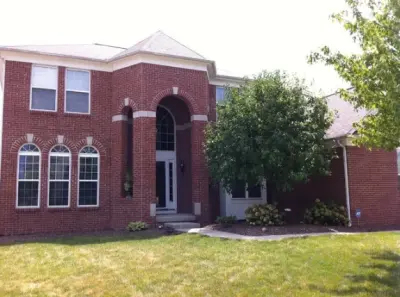 Modern Residential Exterior Coating — House Painting Services project by Custom Colors Painting Company