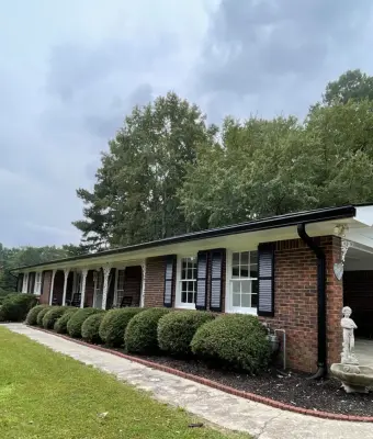 Wood Substitution, Painting, and New Black Gutters — House Painting Services project by North Atlanta Painting