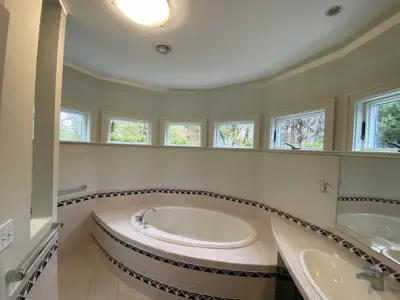 Restoration of water damage, installation of new windows, and interior painting for our Newton, MA client by Powell Painting And Home Services