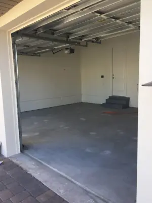 Epoxy-coated garage flooring — House Painting Services project by Wow 1 Day Painting