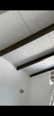 Brown Eggshell Finish on Wooden Beams — House Painting Services project by López Painting