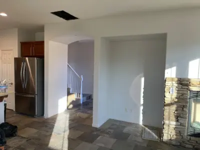 Weathered White Eggshell Interior Repainting — House Painting Services project by López Painting