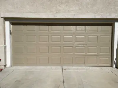 Satin Studio Taupe Garage Door — House Painting Services project by López Painting