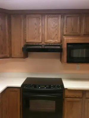 Painted Oak Kitchen Cabinets — House Painting Services project by Painting America, Inc.