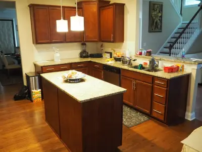 Pure White Painted Cherry Cabinets — House Painting Services project by Wallscapers Kitchen & Bath Innovations