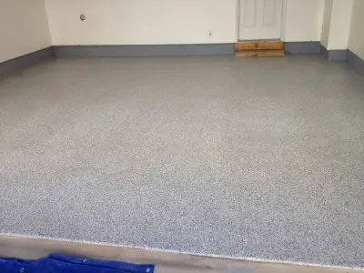 Epoxy and Polyurea Systems for Garage Flooring — House Painting Services project by Hömm Certified Painting Systems