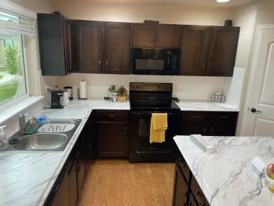From Monochrome to Vibrant — House Painting Services project by Illuminate Cabinet Painting LLC